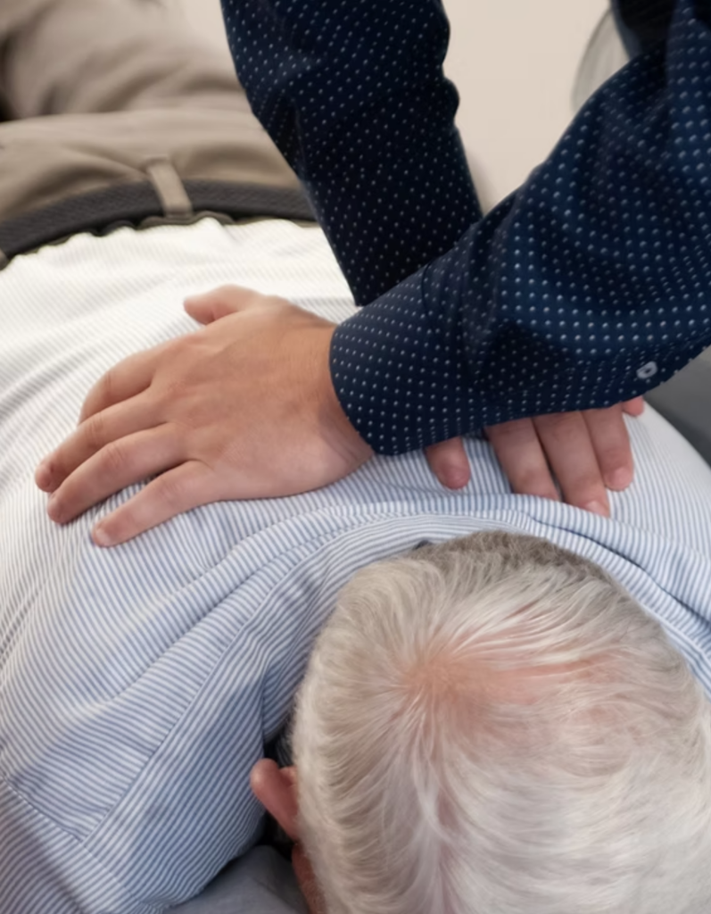 Person receiving a chiropractic adjustment.