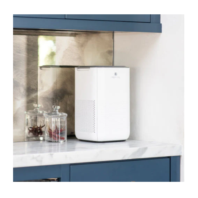 White air purifier on countertop