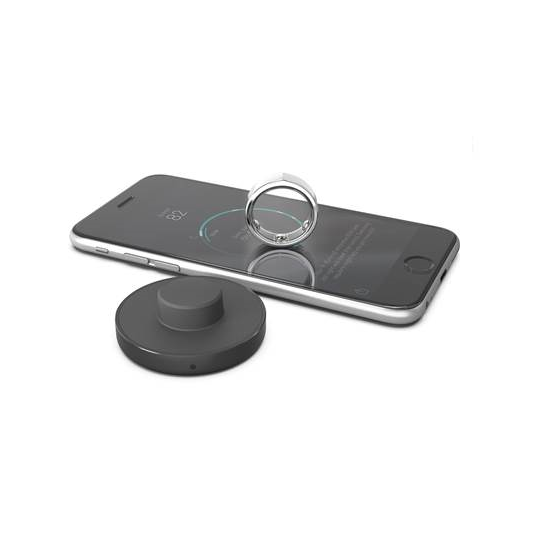 Smart ring on smartphone charging dock