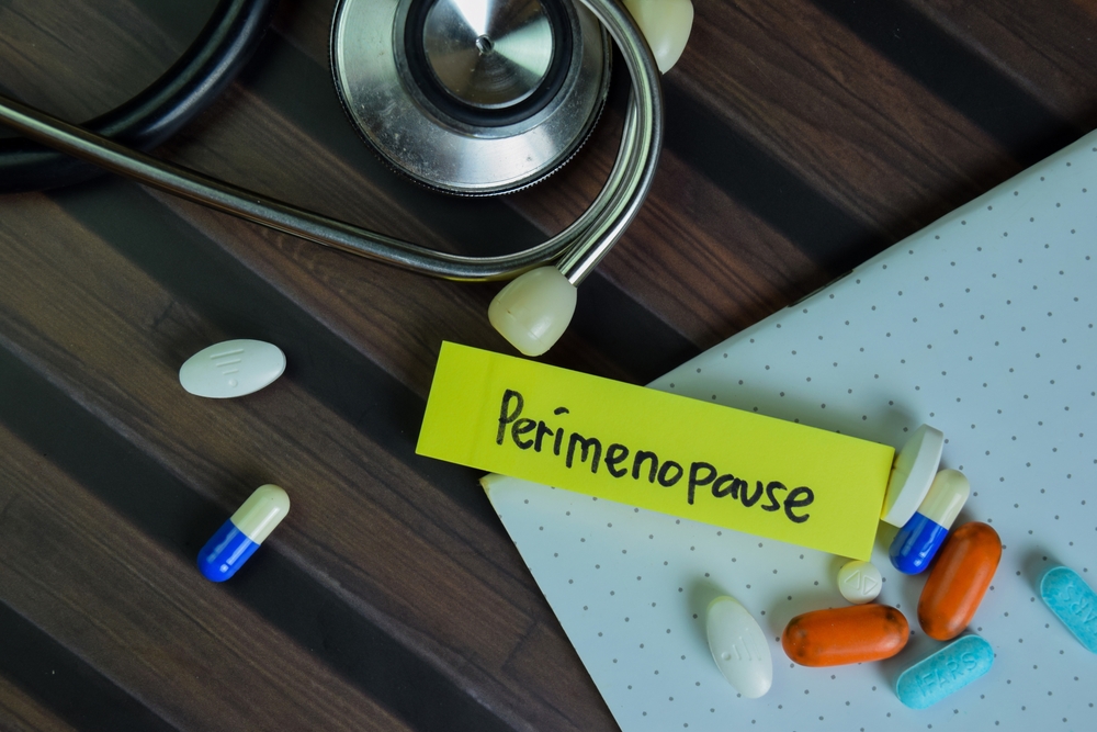 Stethoscope, pills, and perimenopause note