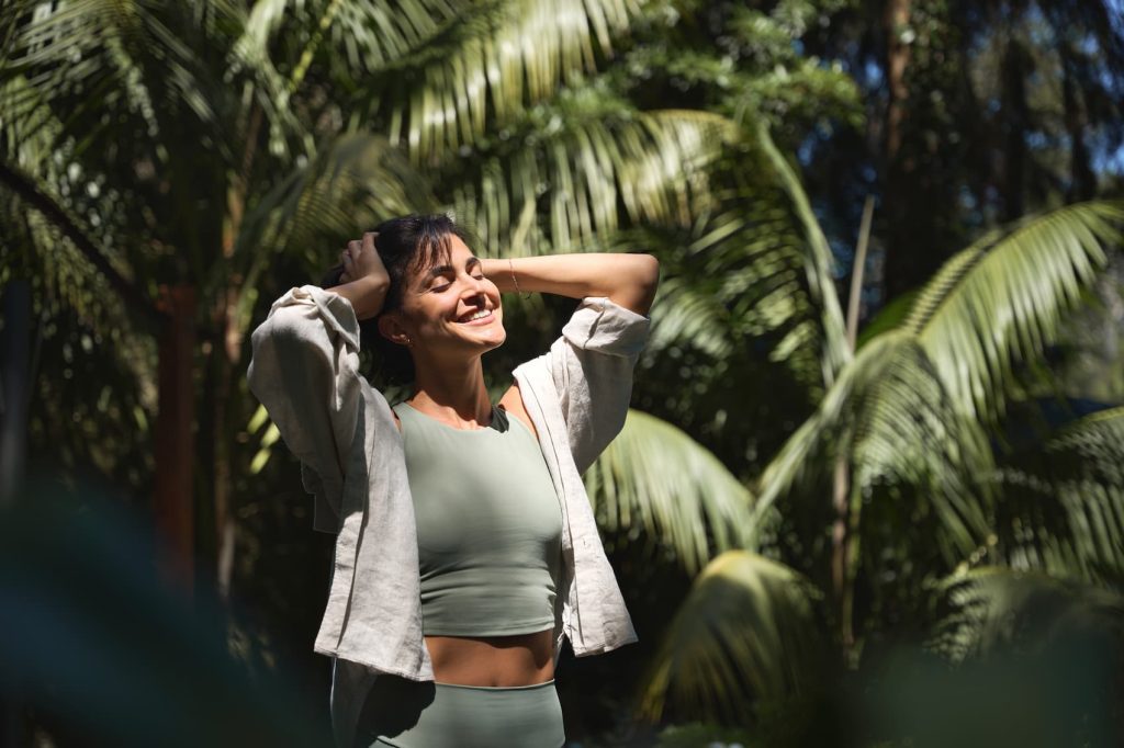 Woman enjoying nature in sunlight